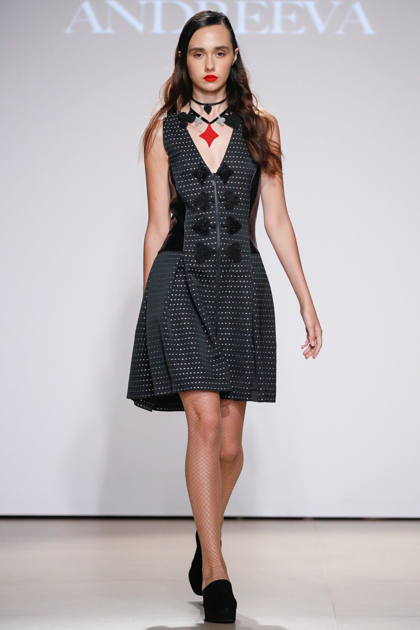 fitted black sleeveless dress