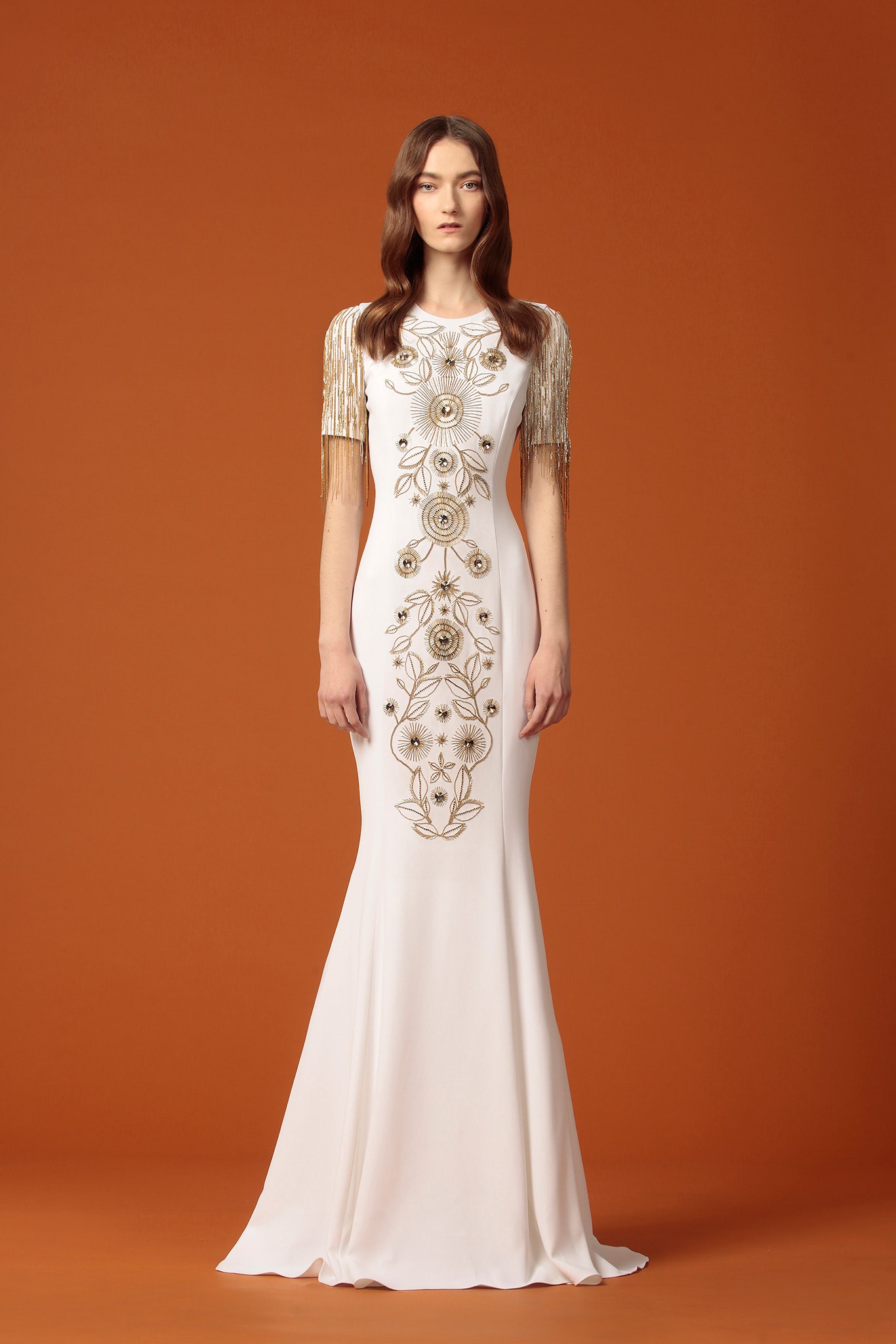 white embroidered fitted gown