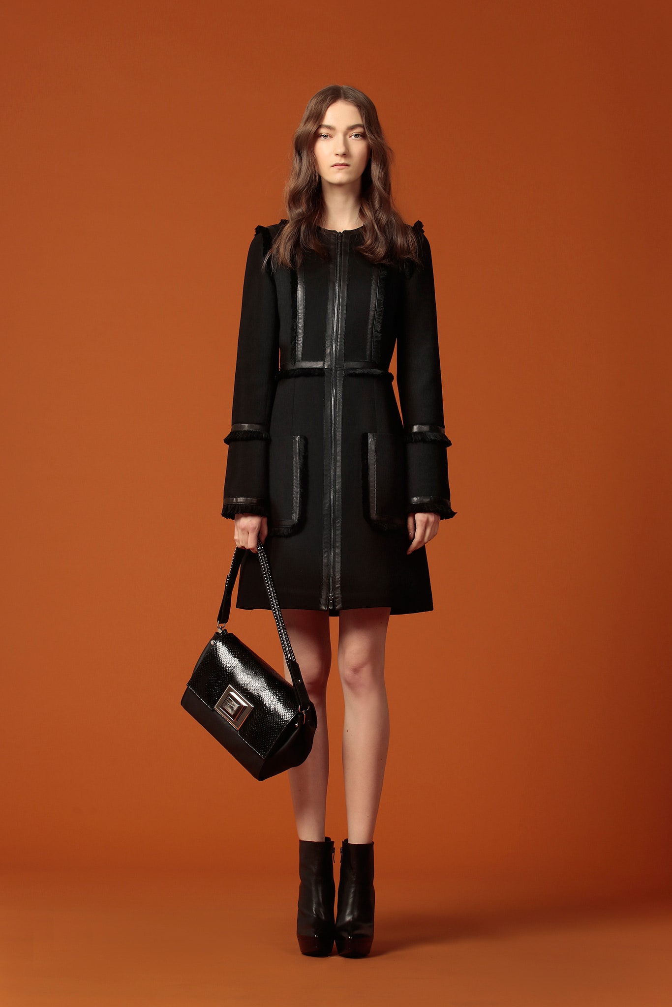 black wool long-sleeve collared fitted zippered pockets coat