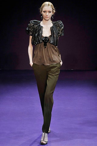 black and brown fitted top with tailored pants