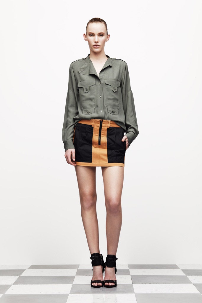 green cotton shirt with black orange skirt
