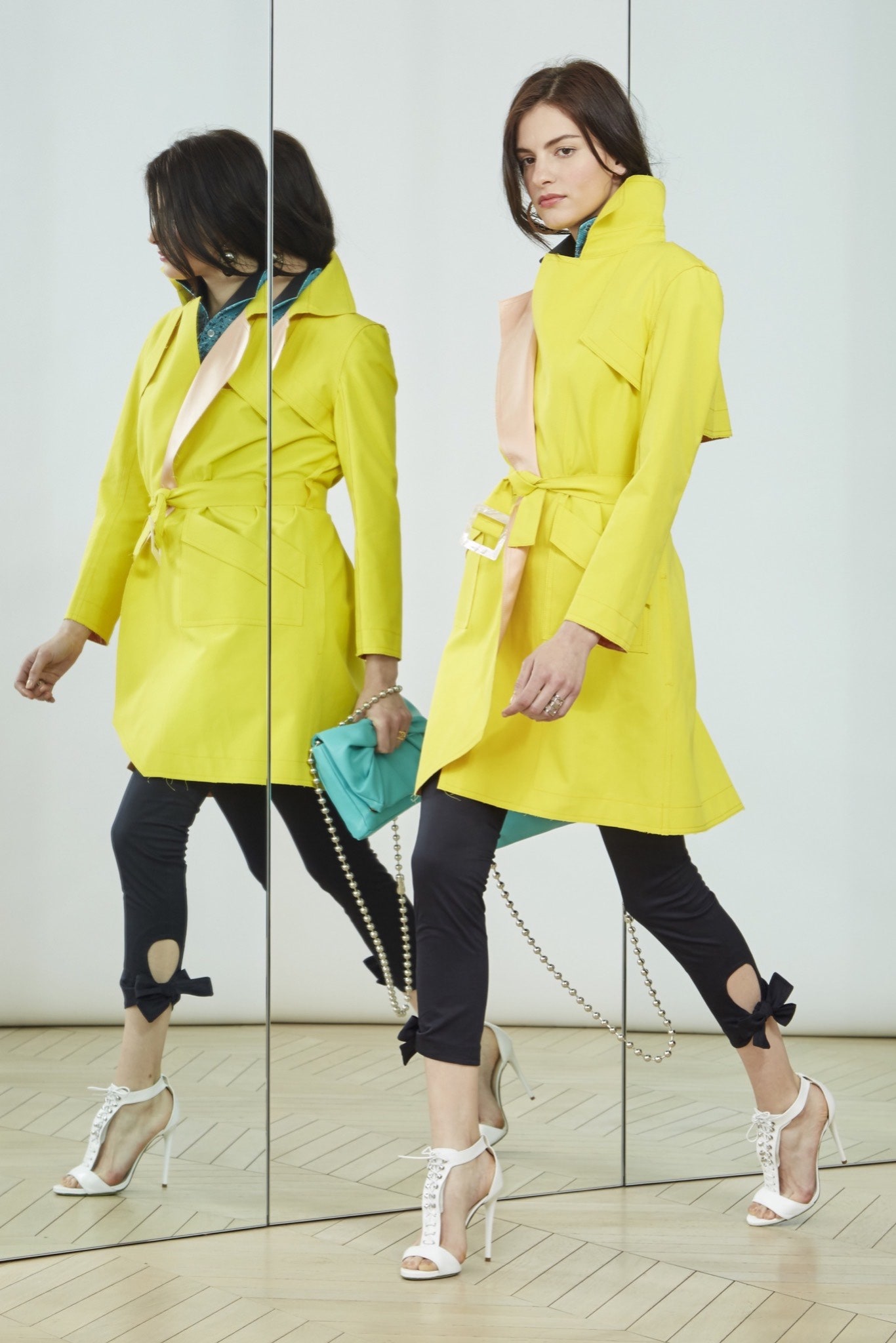 yellow belted coat with black pants