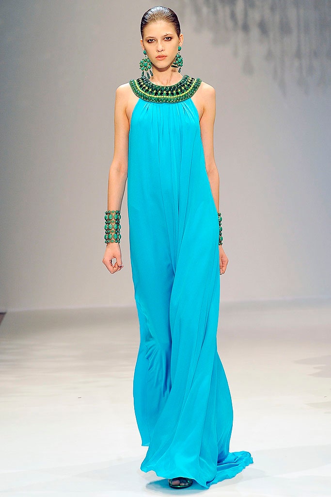 blue flowing sleeveless gown