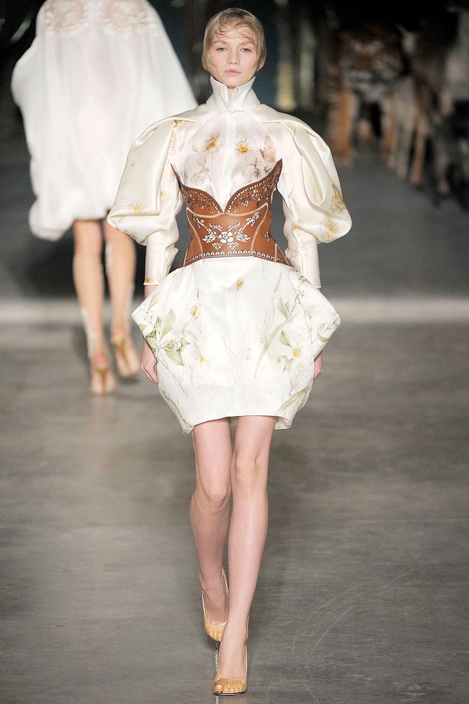 white mini dress with brown corset
