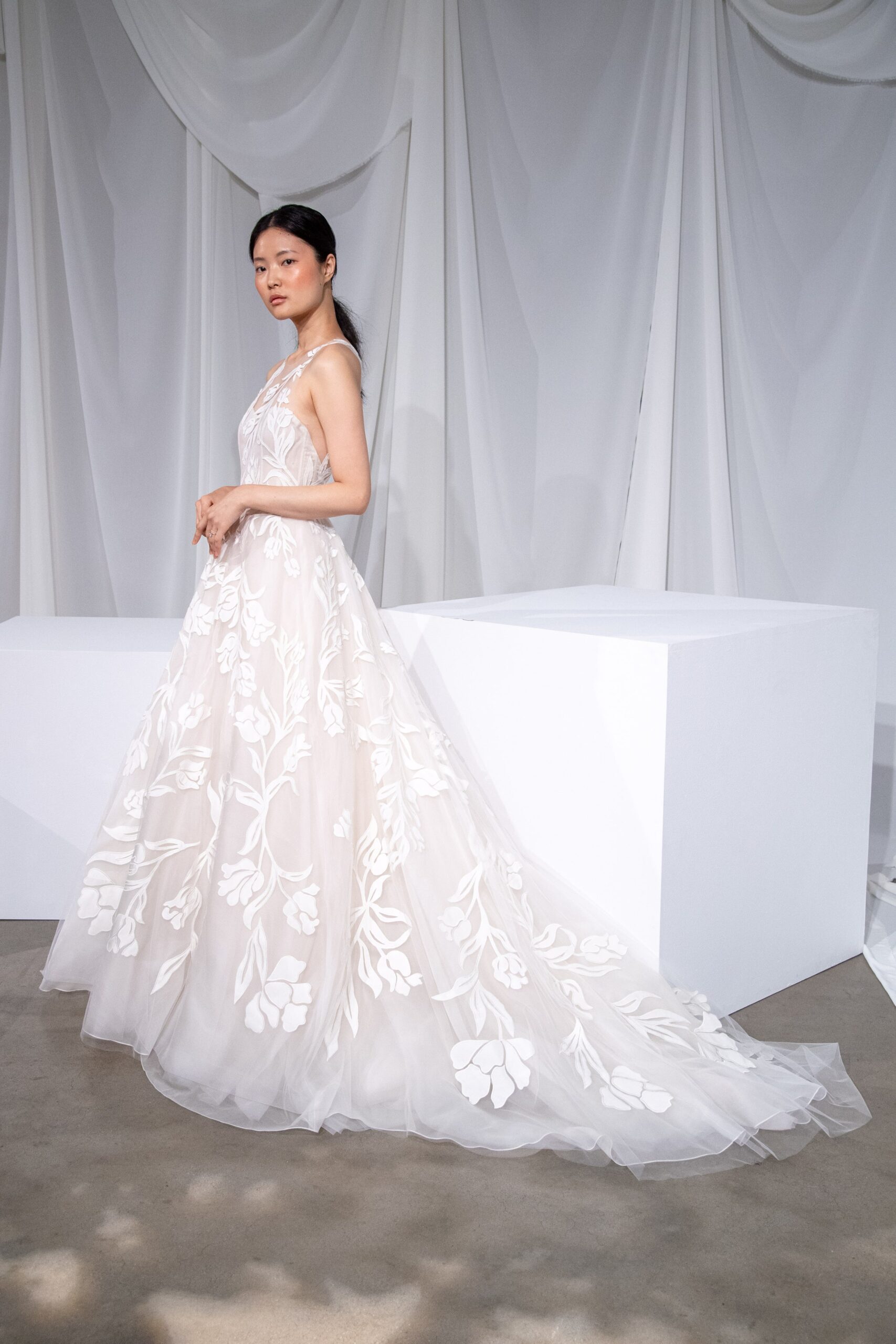 white embroidered tulle gown