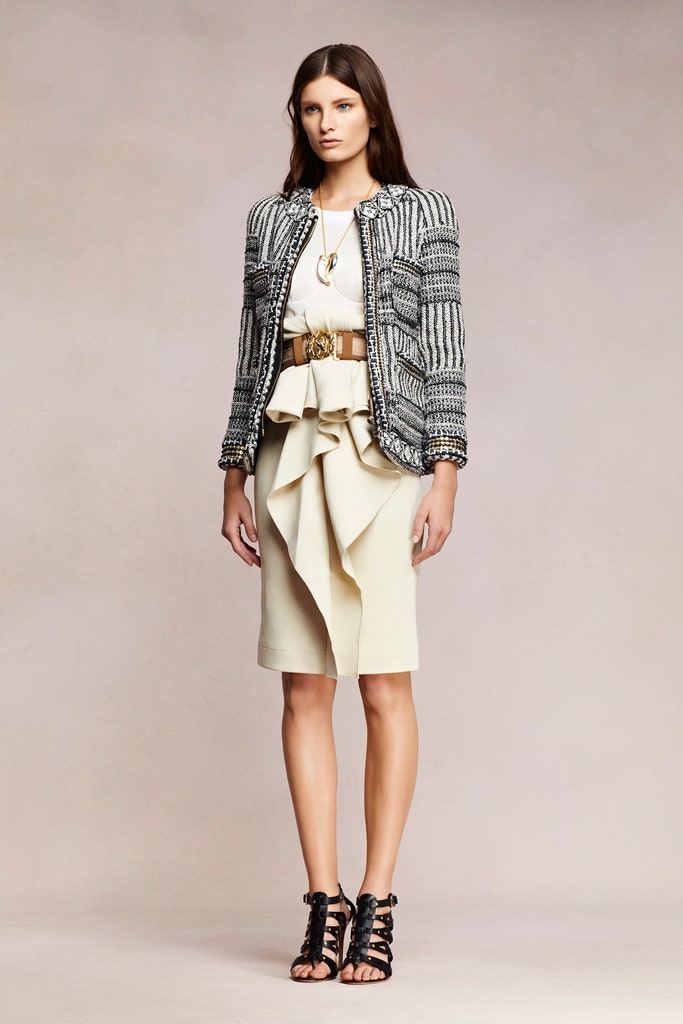 tailored black and white jacket with ruffled skirt