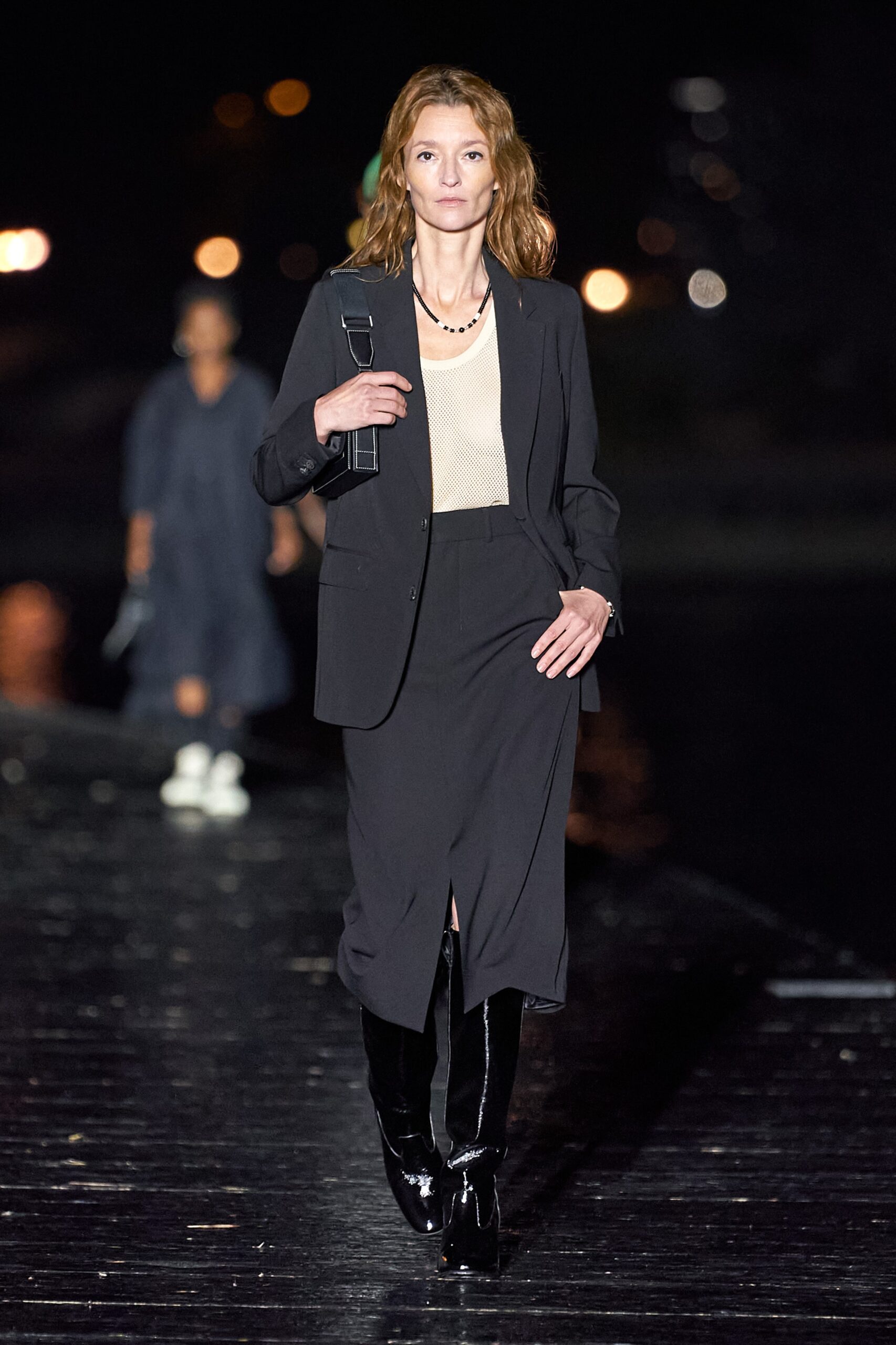 black tailored suit with beige top