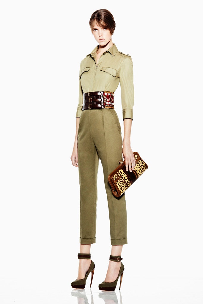 green fitted jumpsuit with accessories