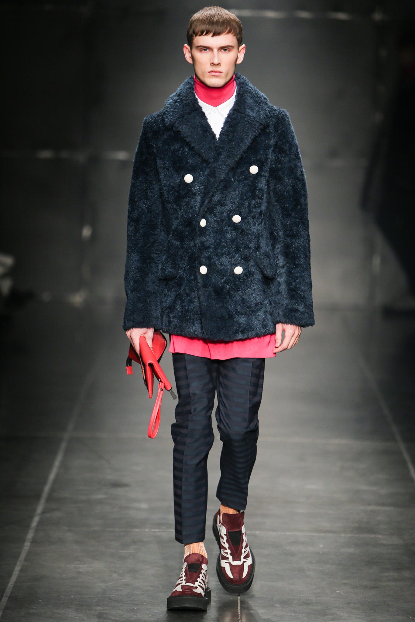 navy faux-fur coat with red top