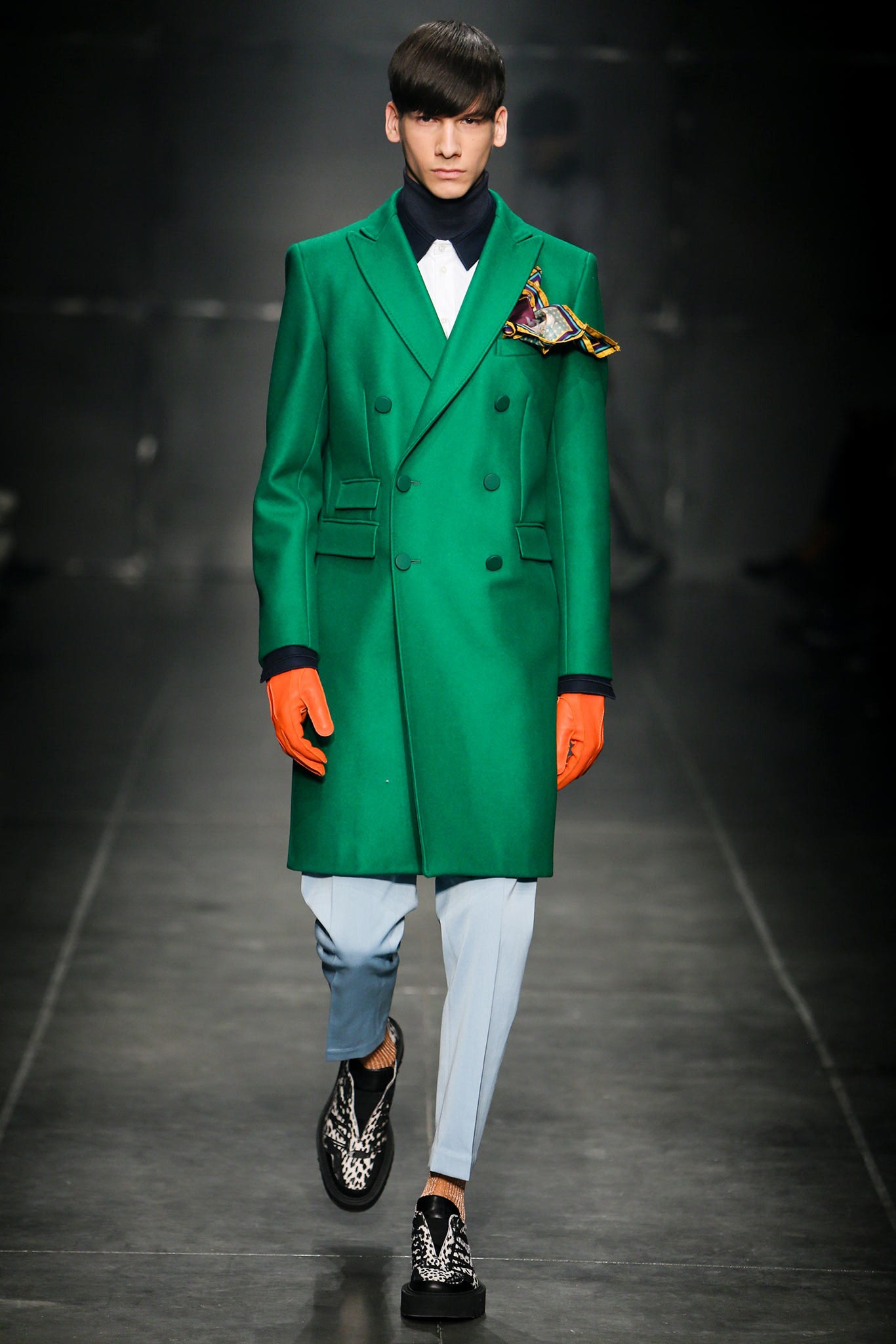 green tailored coat with gloves