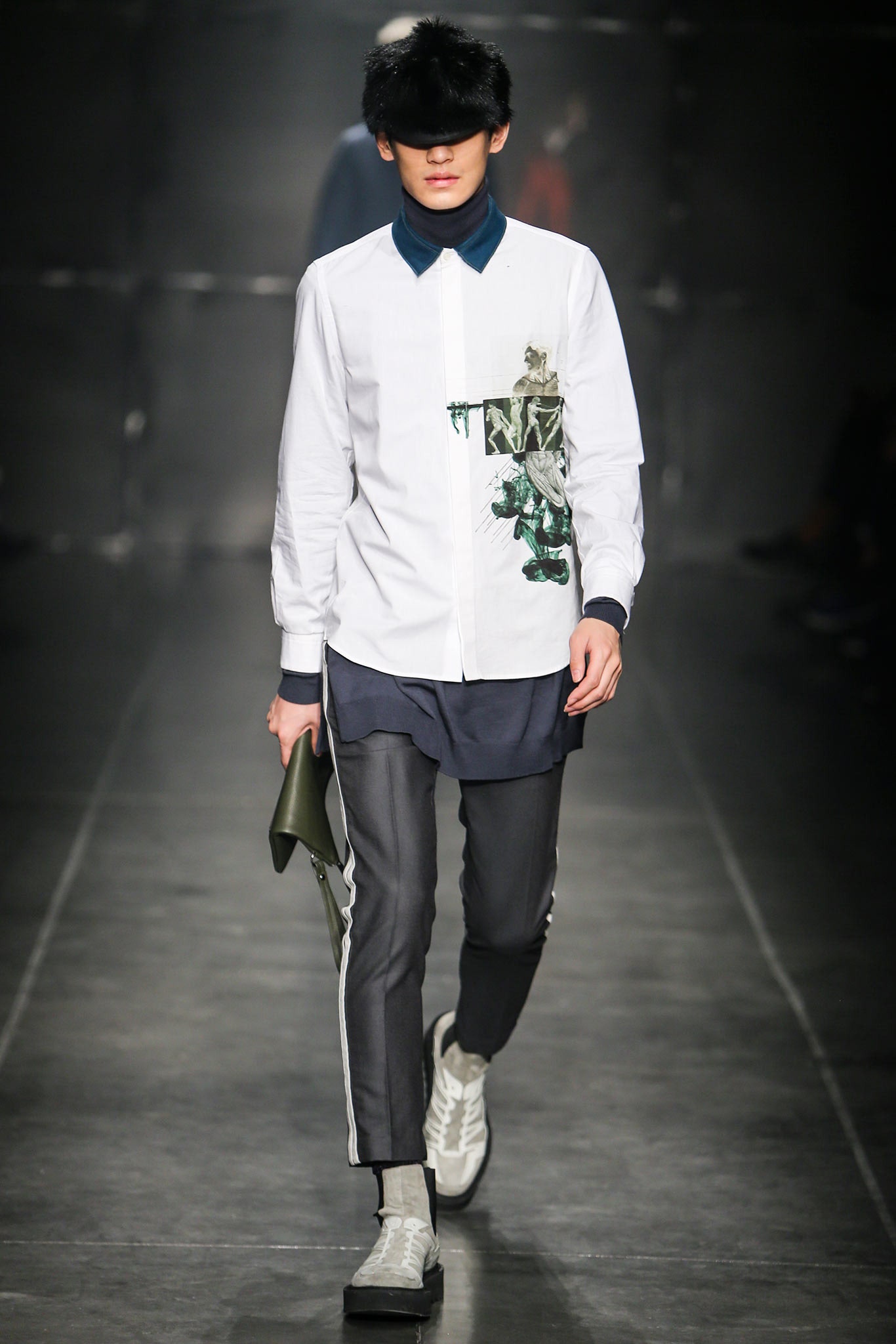 white relaxed shirt with gray pants
