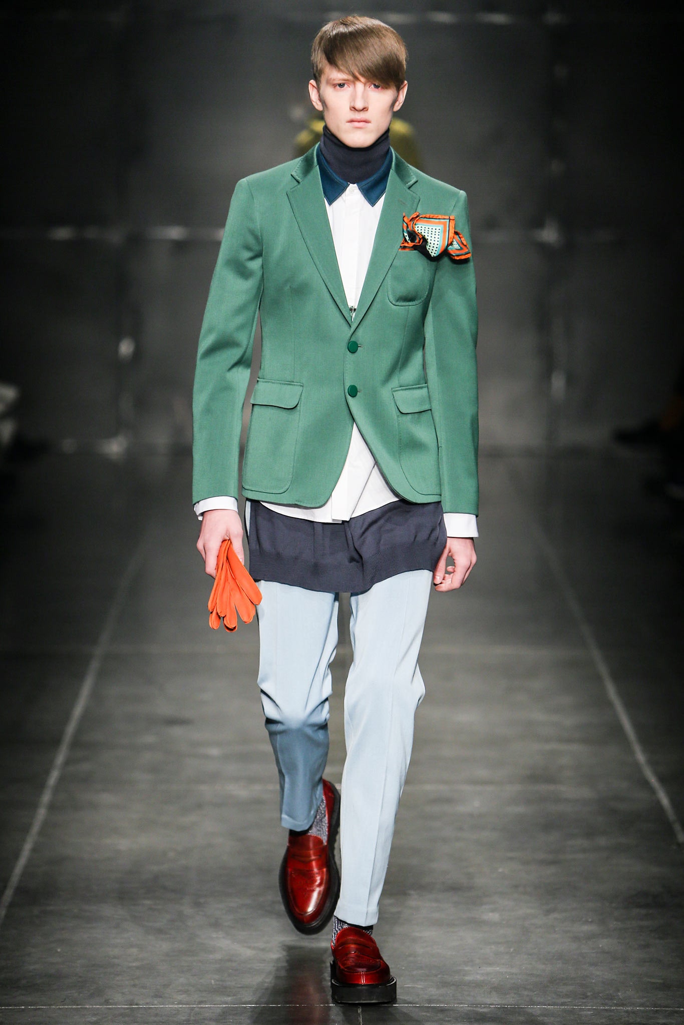 green tailored blazer with white shirt
