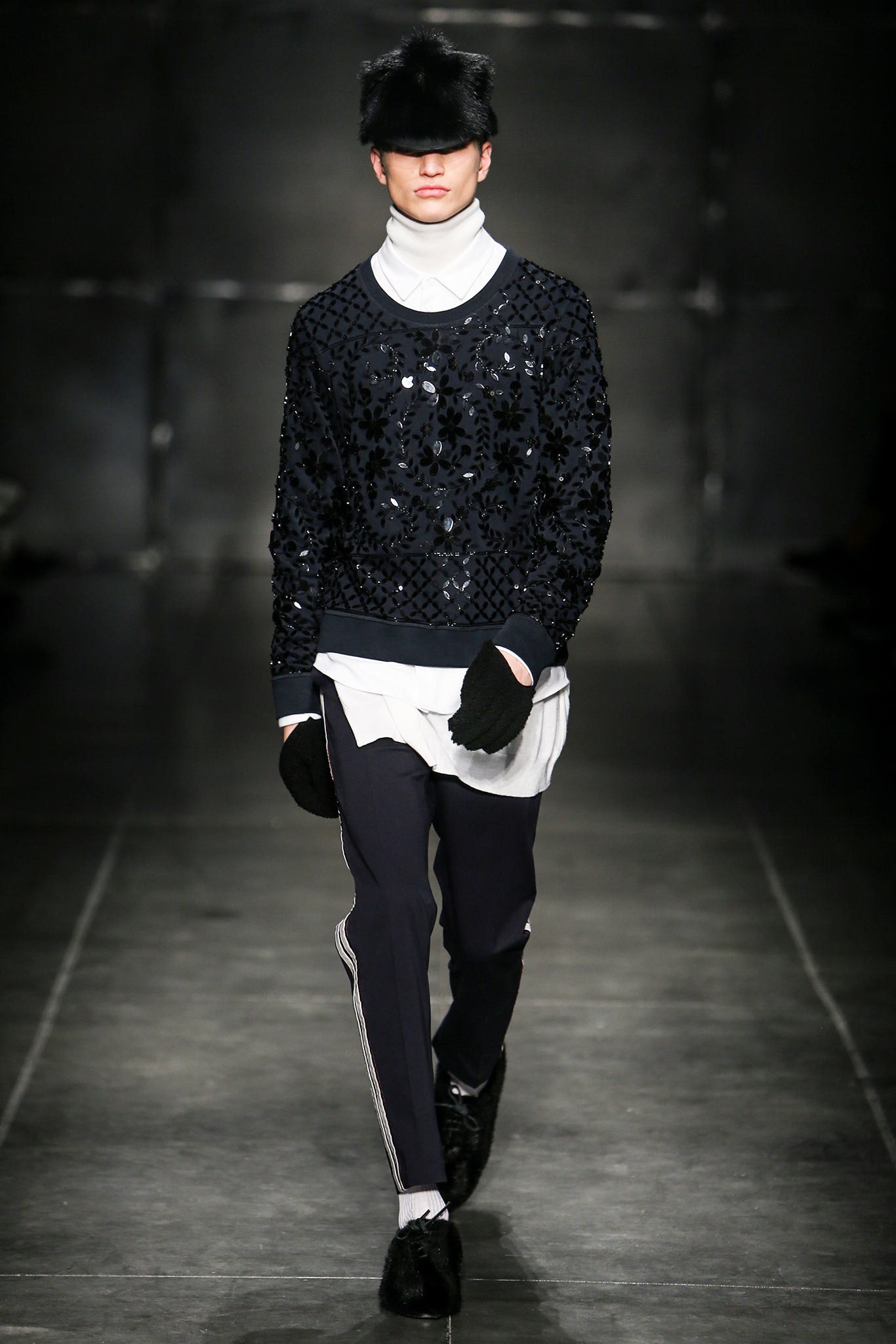 black sequined sweater with white shirt