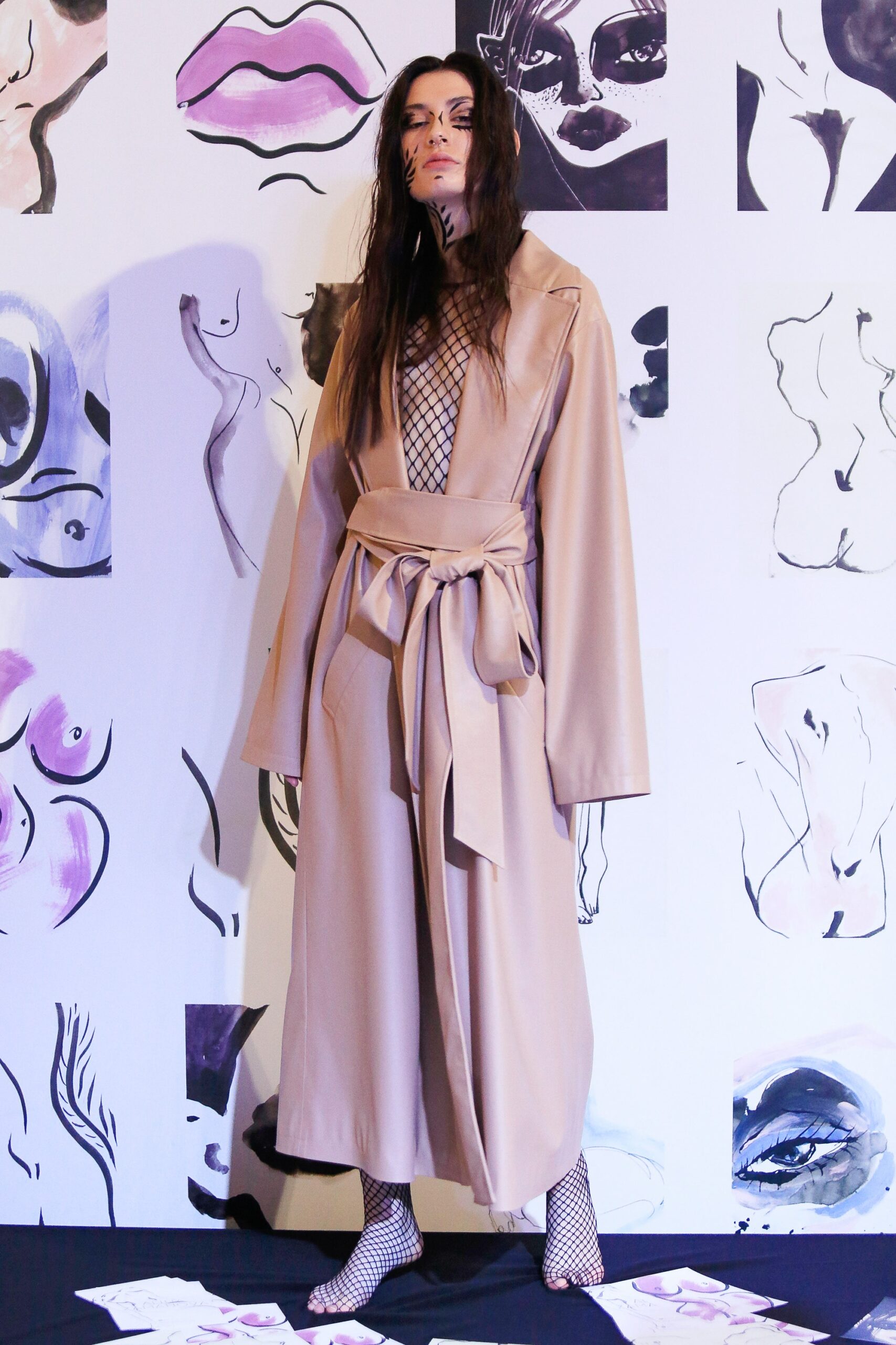 beige leather coat with black mesh top