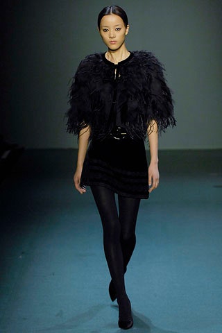 black mini velvet dress with feather cape