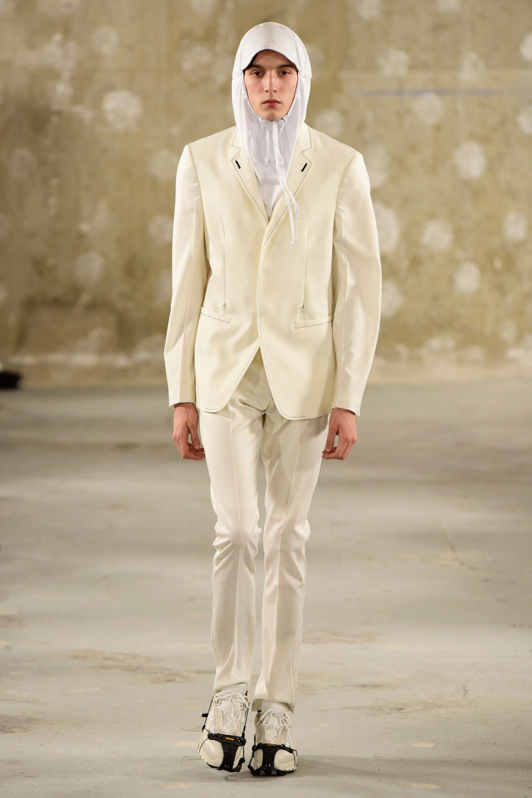 white tailored suit with hat