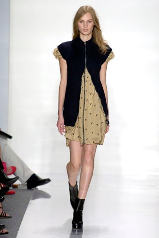 beige embroidered mini dress with navy jacket