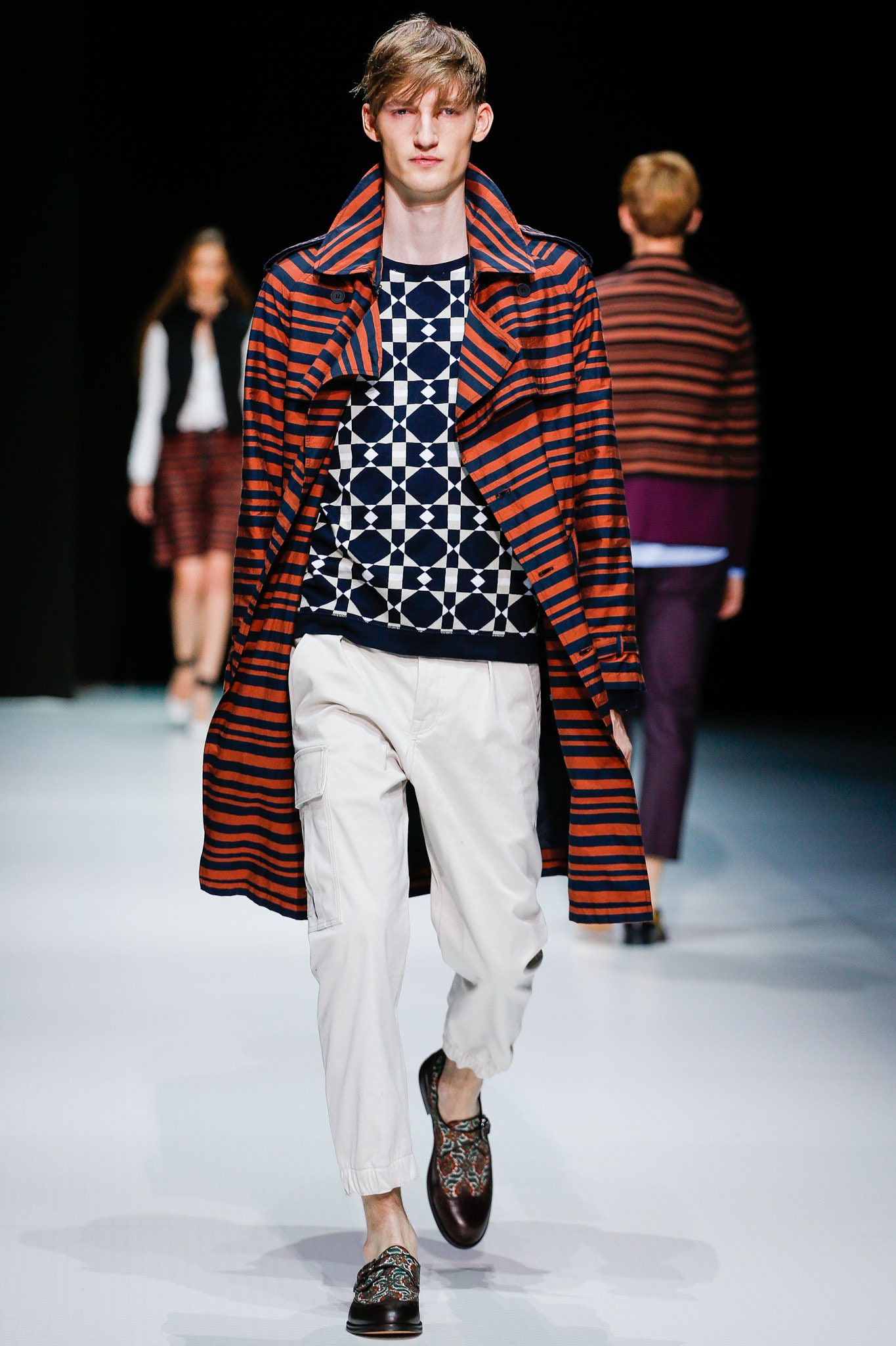 relaxed red and blue coat with fitted sweater