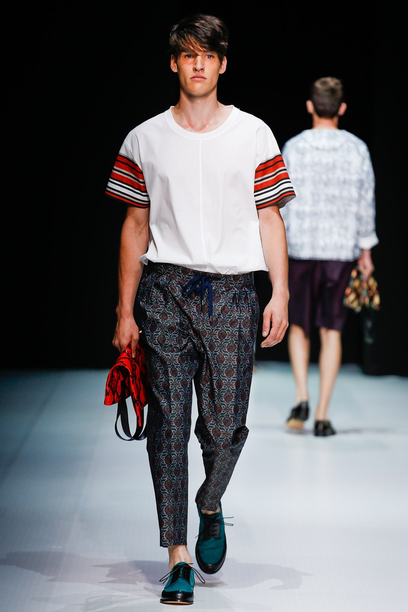 white color-blocked t-shirt and blue printed pants