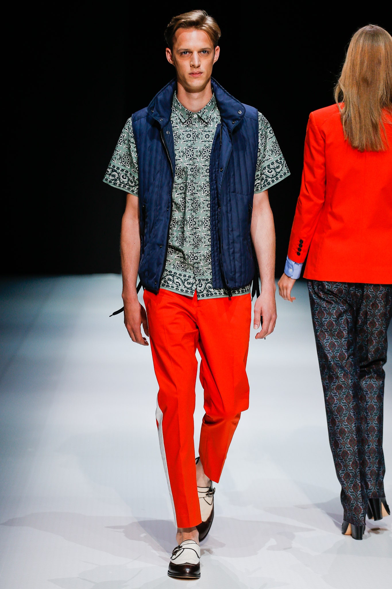 navy vest green shirt red pants