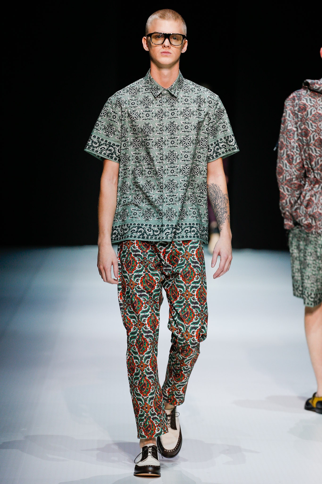 printed green shirt and red pants