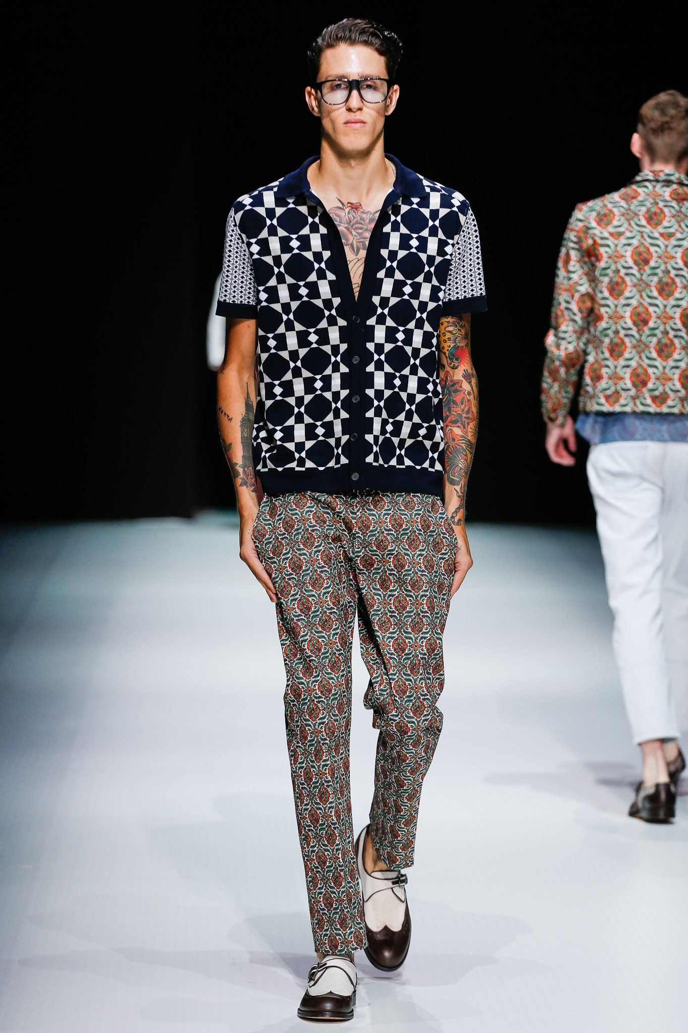 navy printed short-sleeve shirt with patterned pants