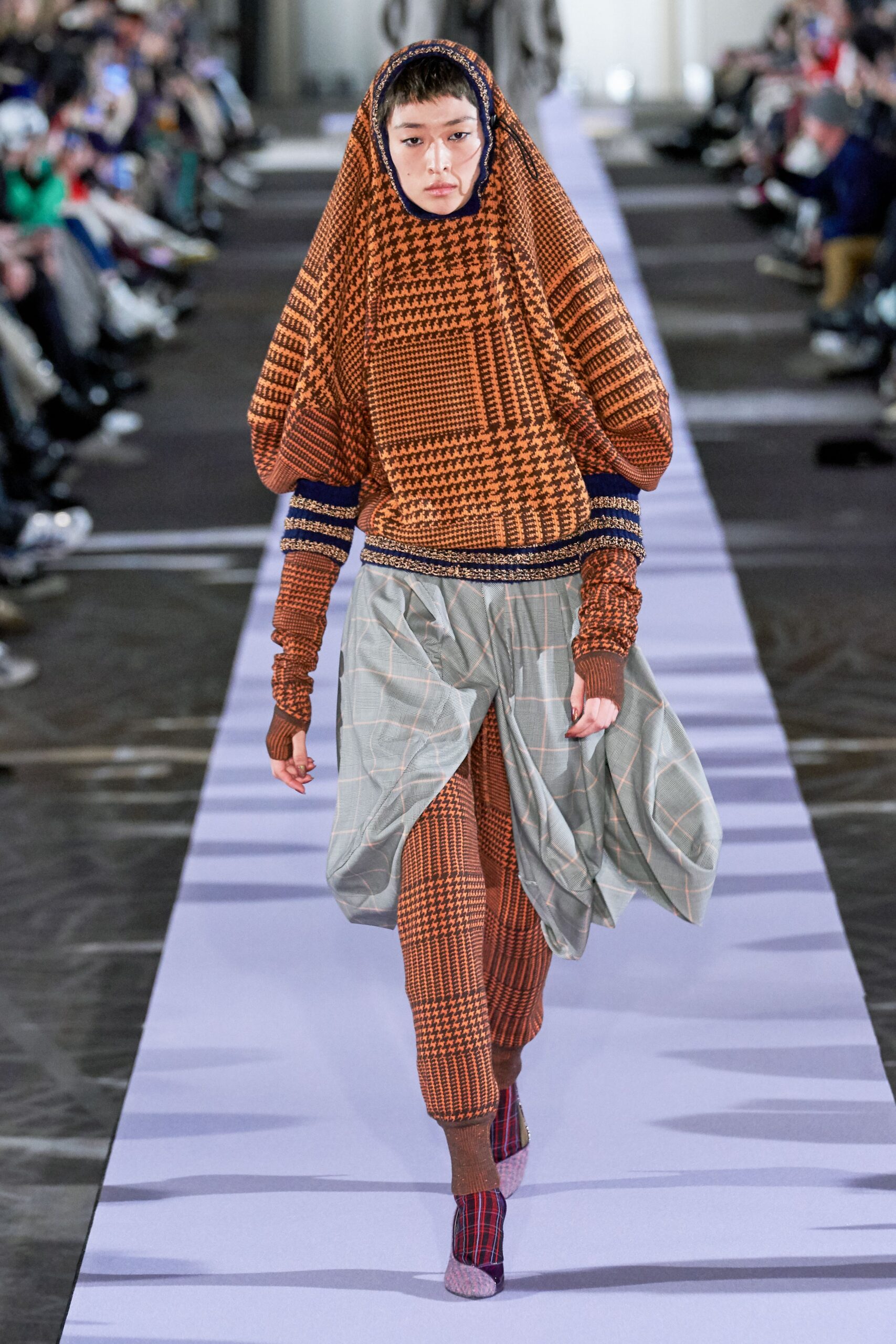 oversized knit top with checkered pants