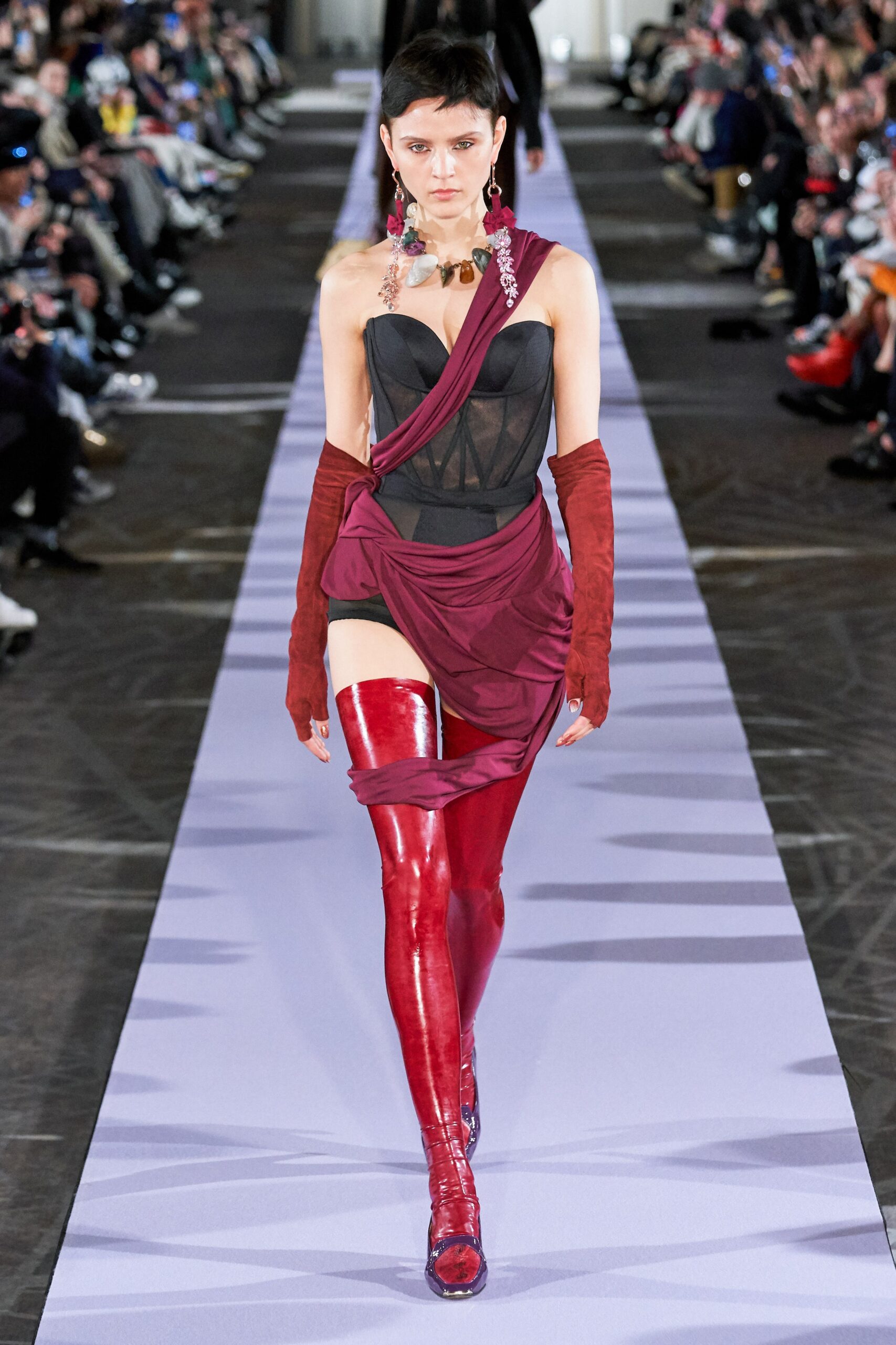 fitted black and red dress with gloves