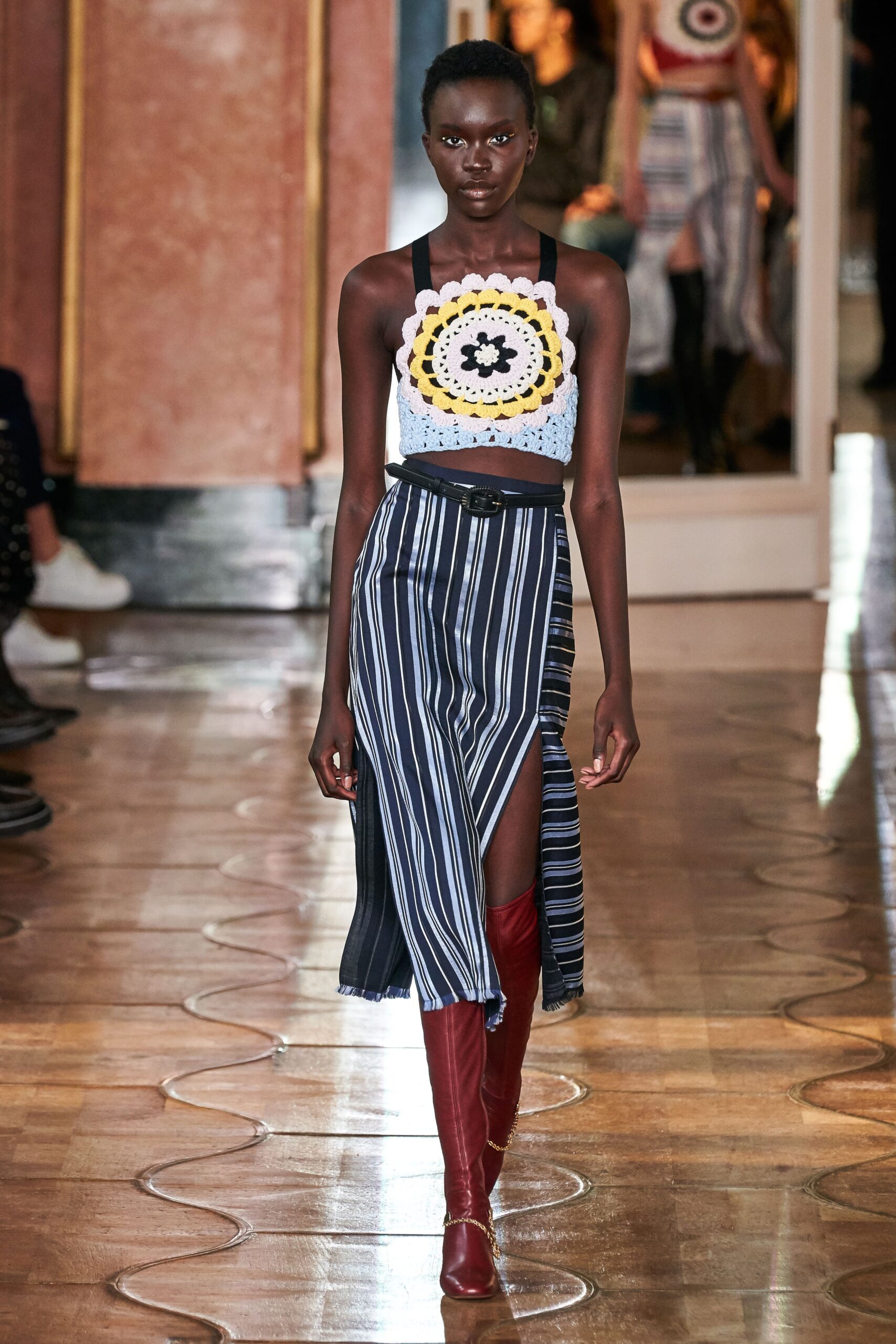 crochet top with striped midi skirt