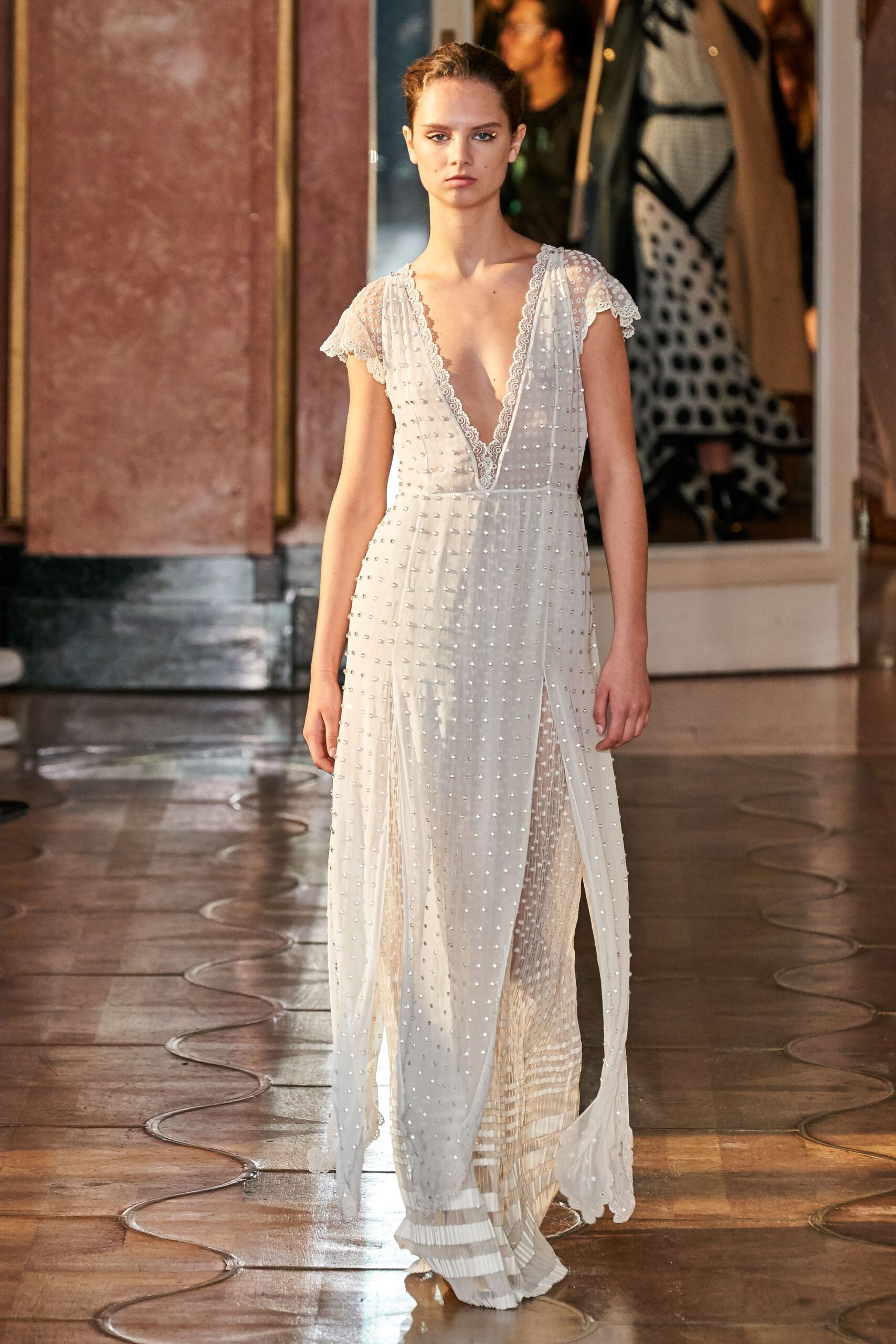 white silk sleeveless gown