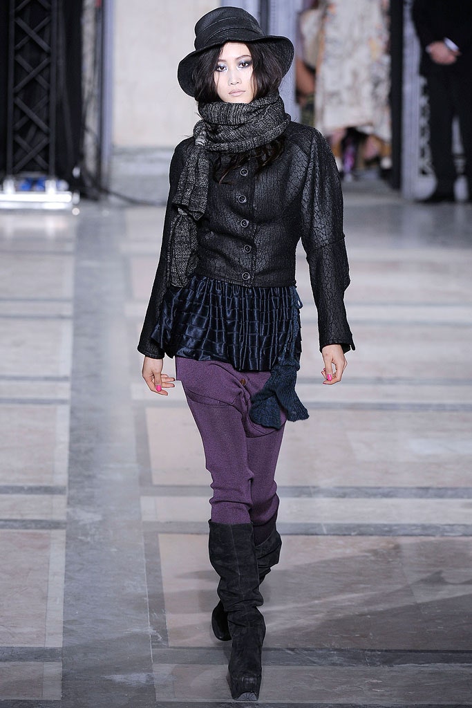 black fitted jacket with purple pants