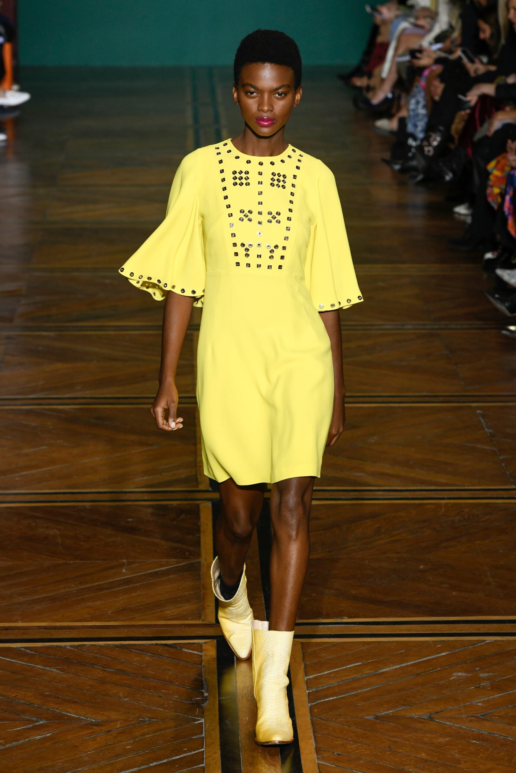 yellow fitted dress with embellishments