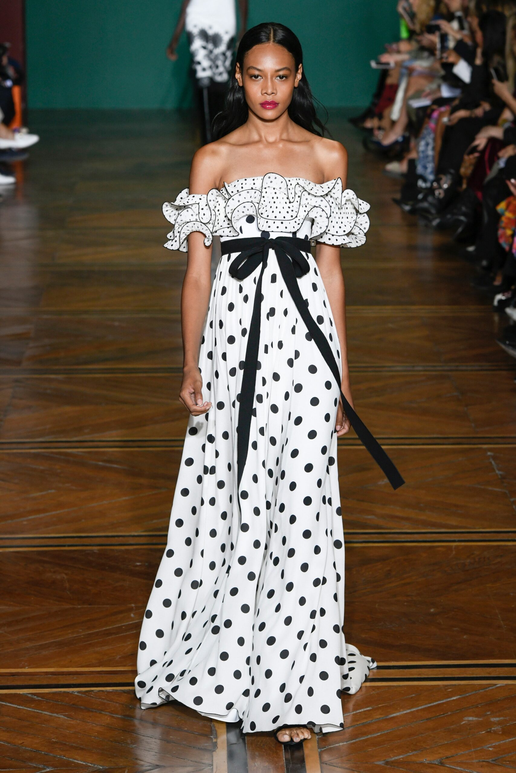 white and black polka-dot gown