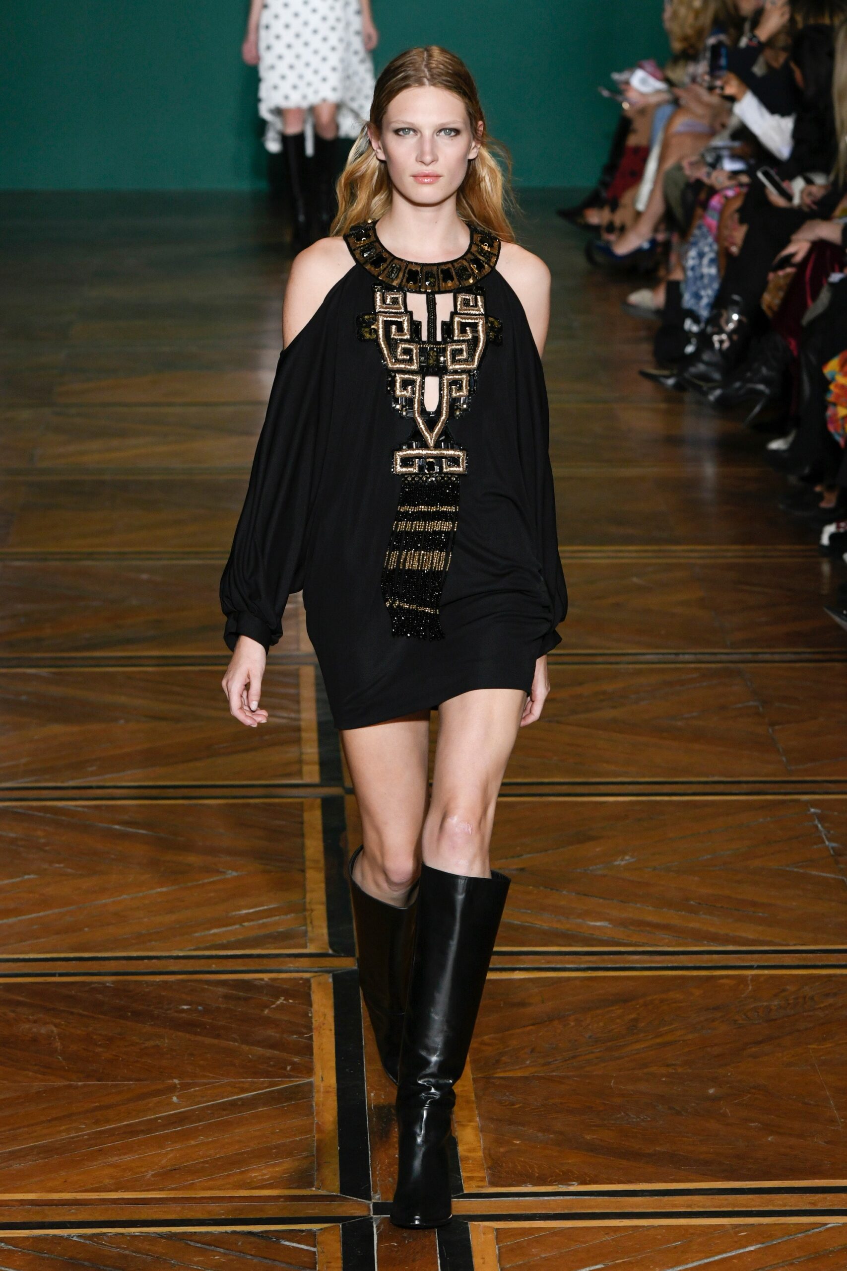 black off-shoulder mini dress with boots