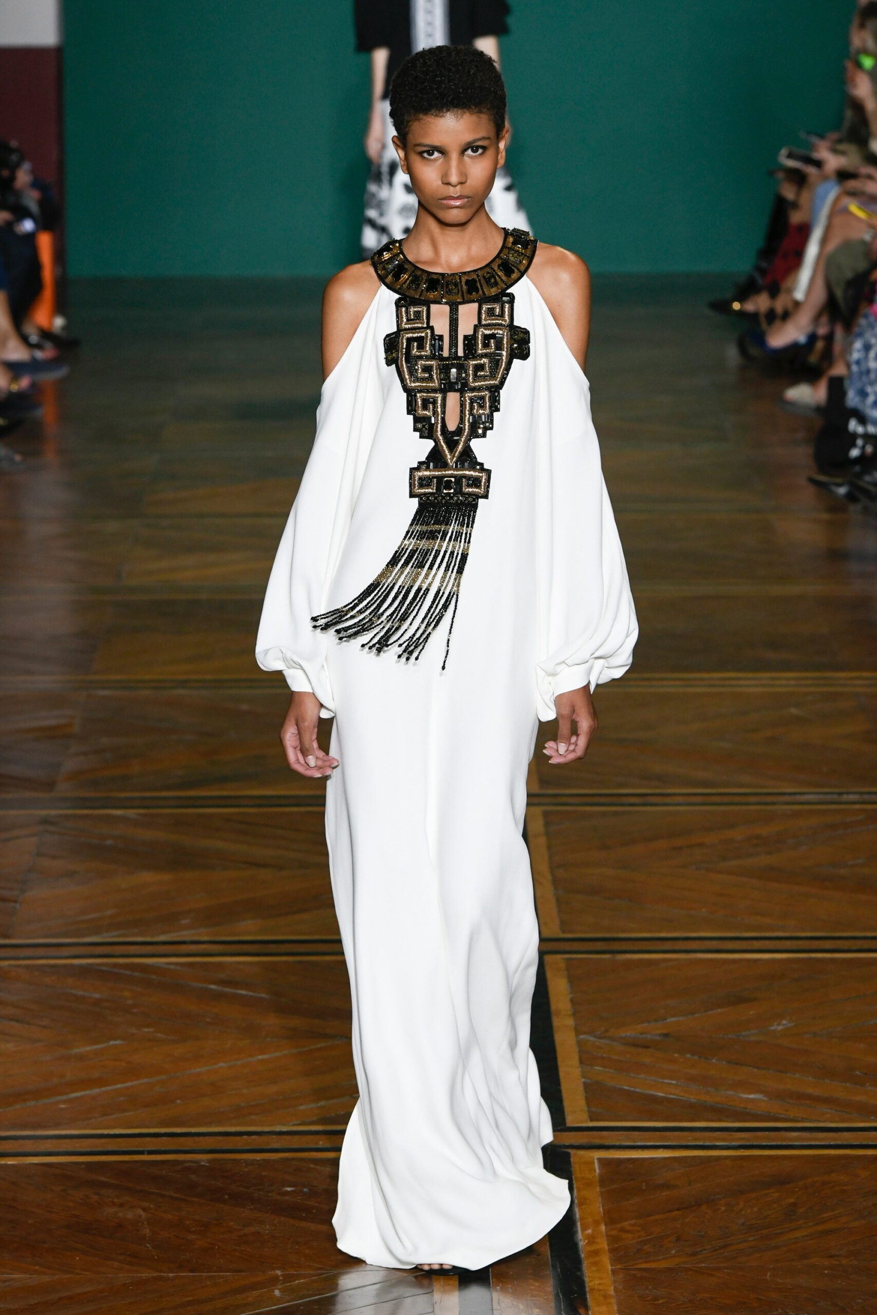 white silk off-shoulder gown