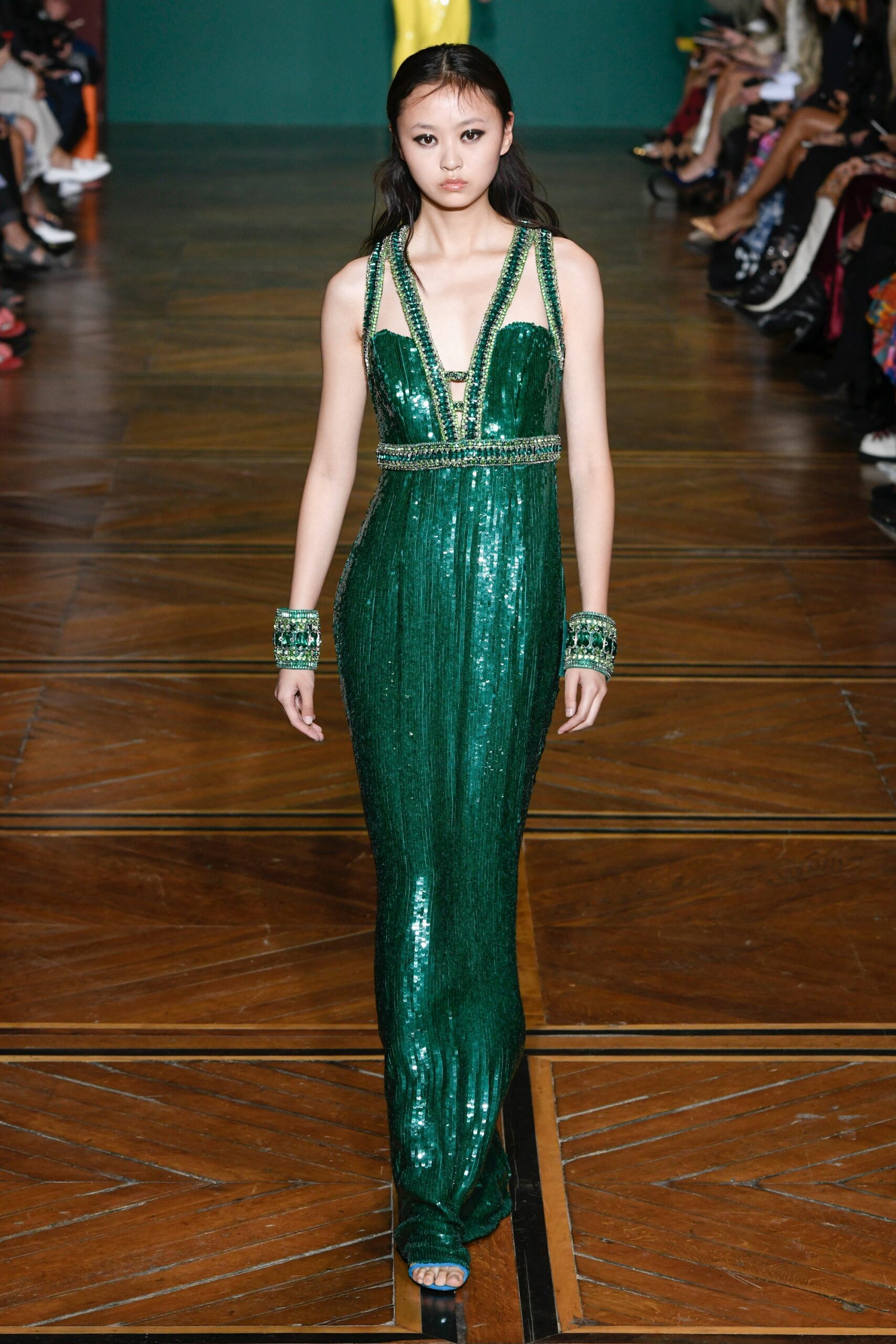 green sequin sleeveless gown