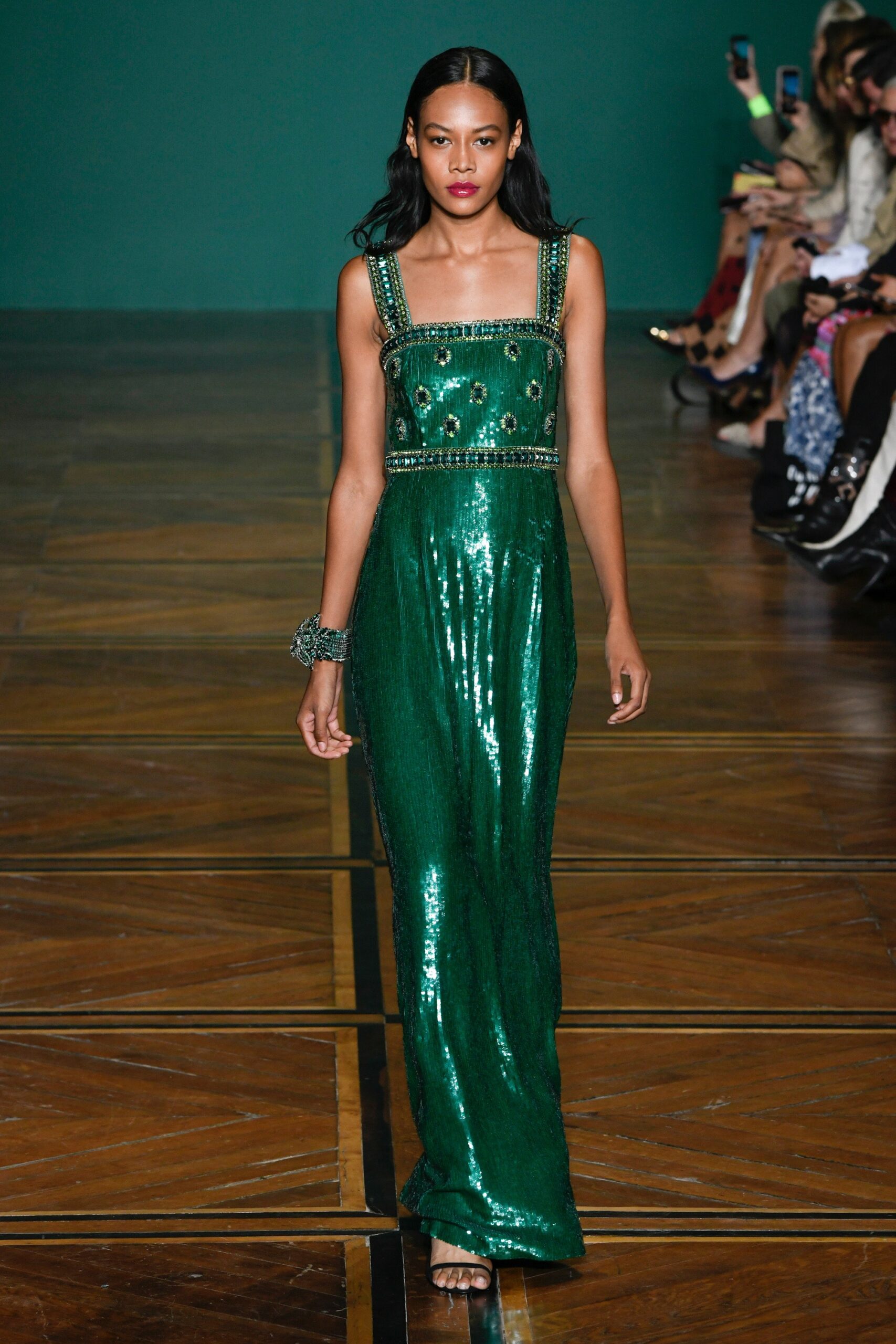 green sequin sleeveless gown