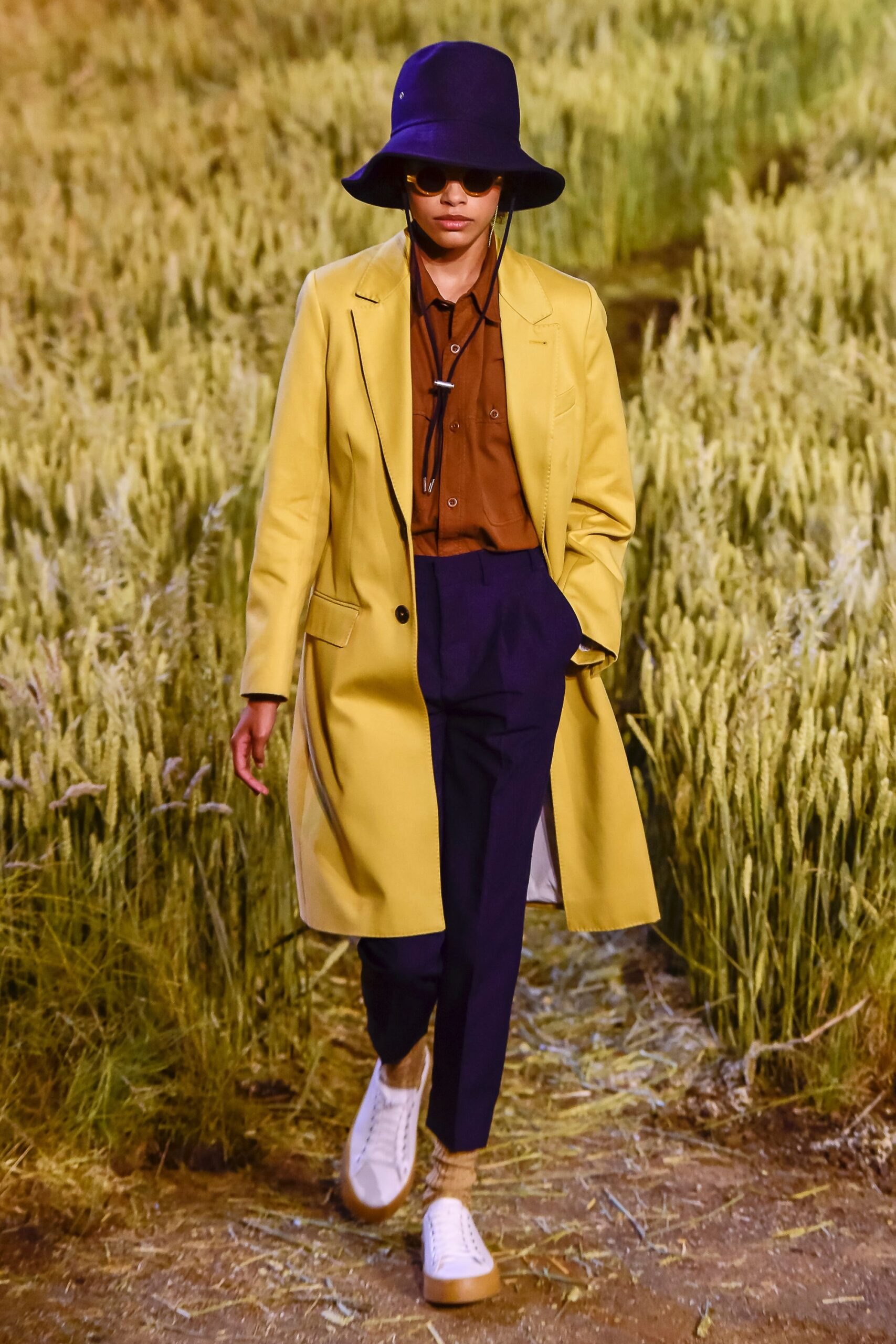 yellow coat with navy pants