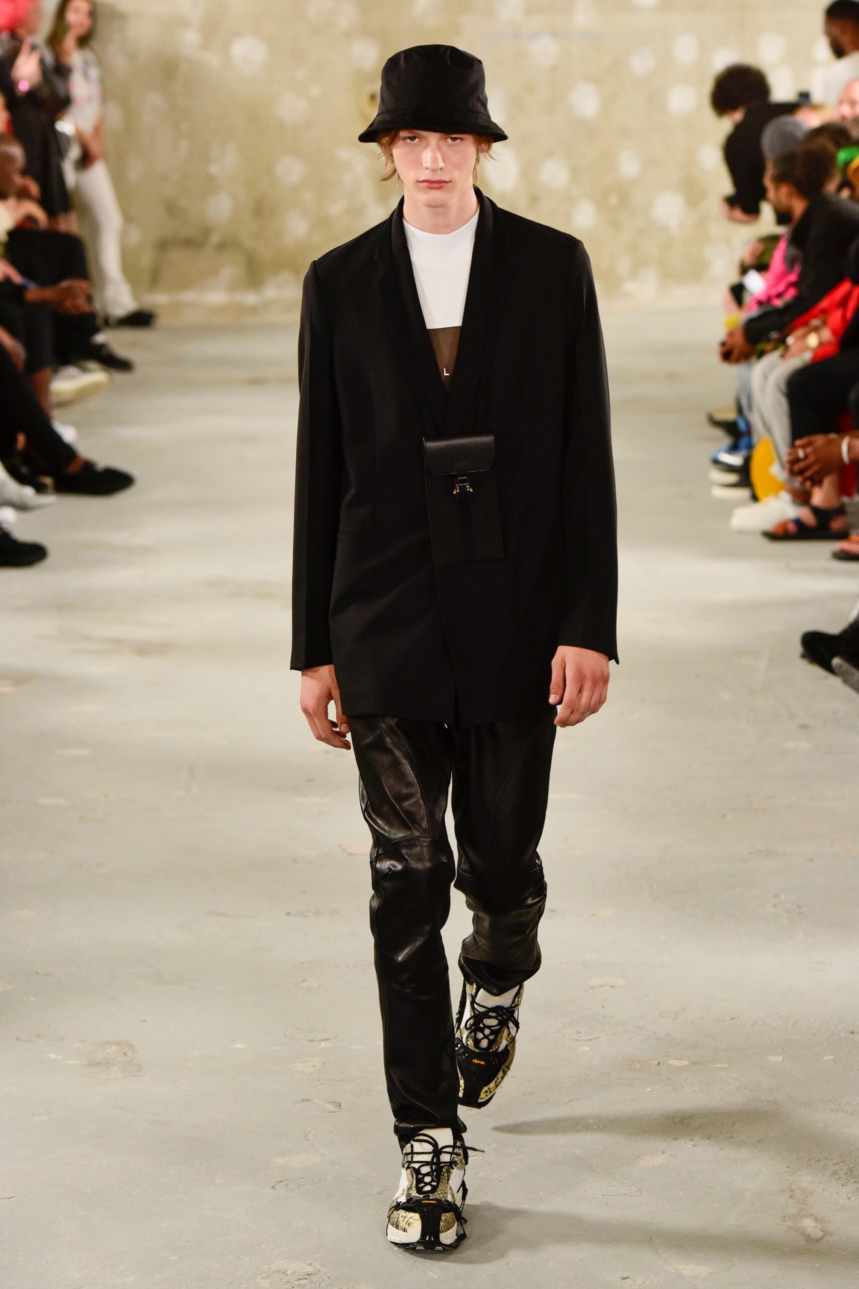 black tailored blazer with leather pants