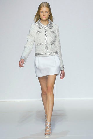 white tweed jacket with pleated skirt