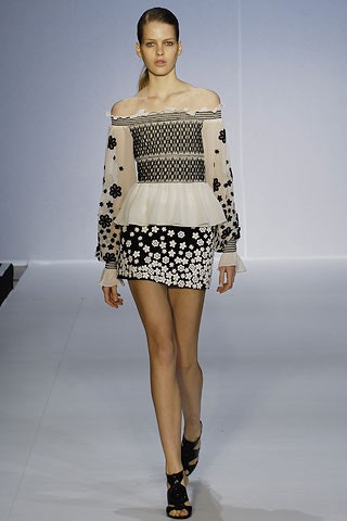 black and white embroidered top and mini skirt