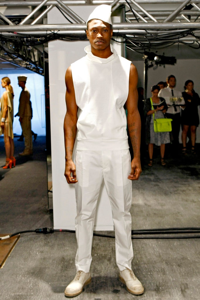 white sleeveless hoodie and pants