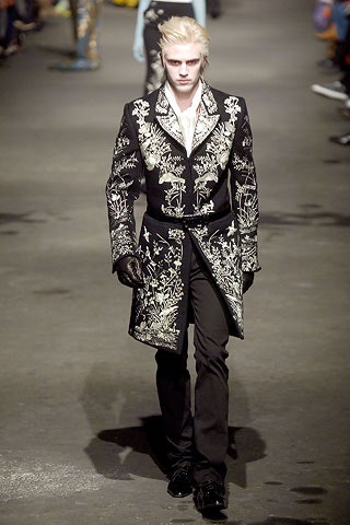 black embroidered coat with fitted pants