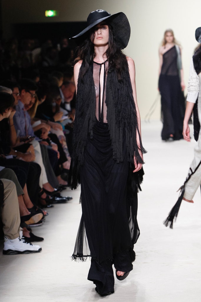 black flowing maxi dress with fringes