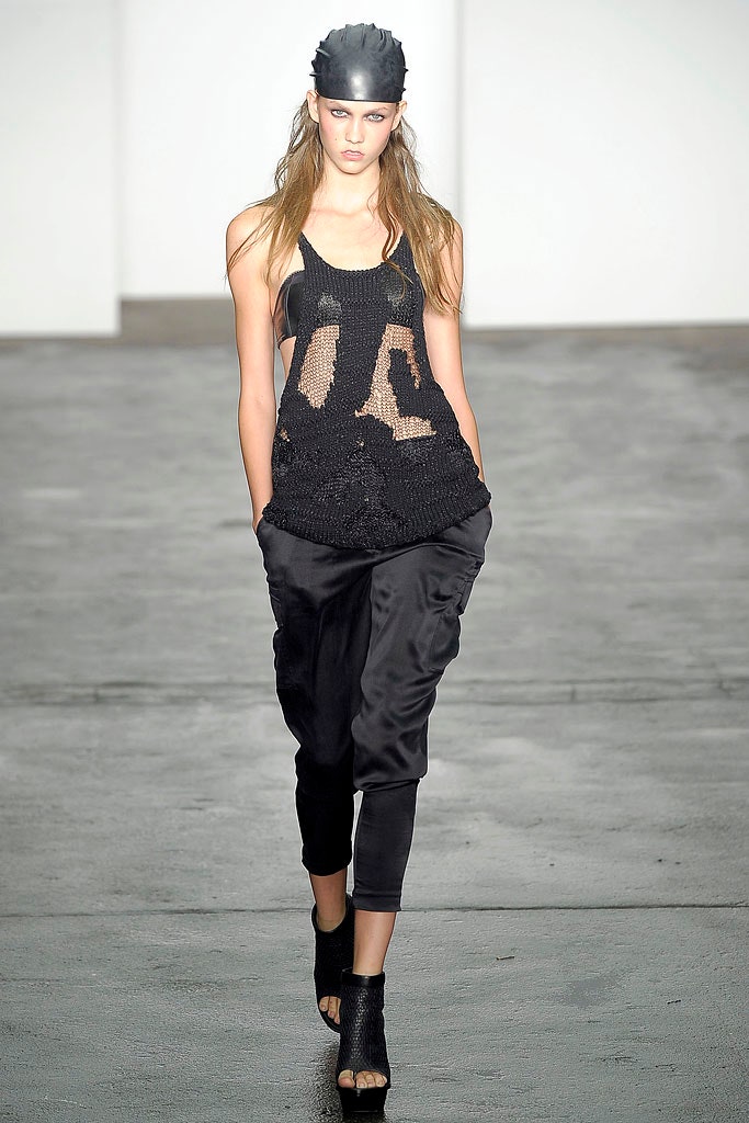 black fitted top and relaxed pants