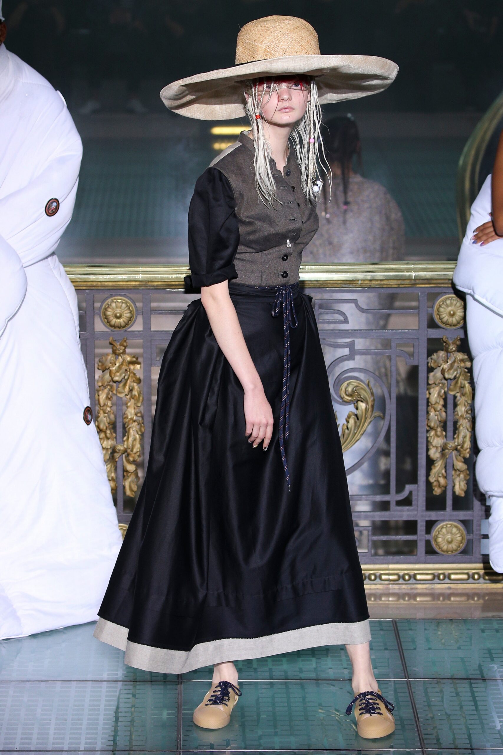 black silk midi dress with wide-brimmed hat