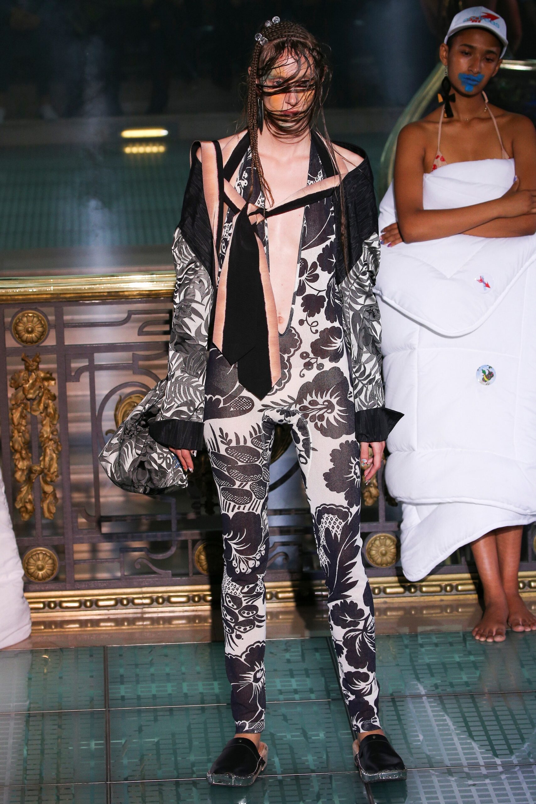 black and white printed catsuit with oversized jacket