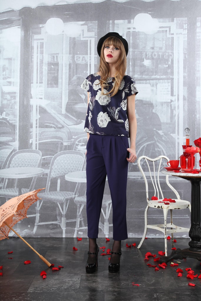 navy floral top with purple pants