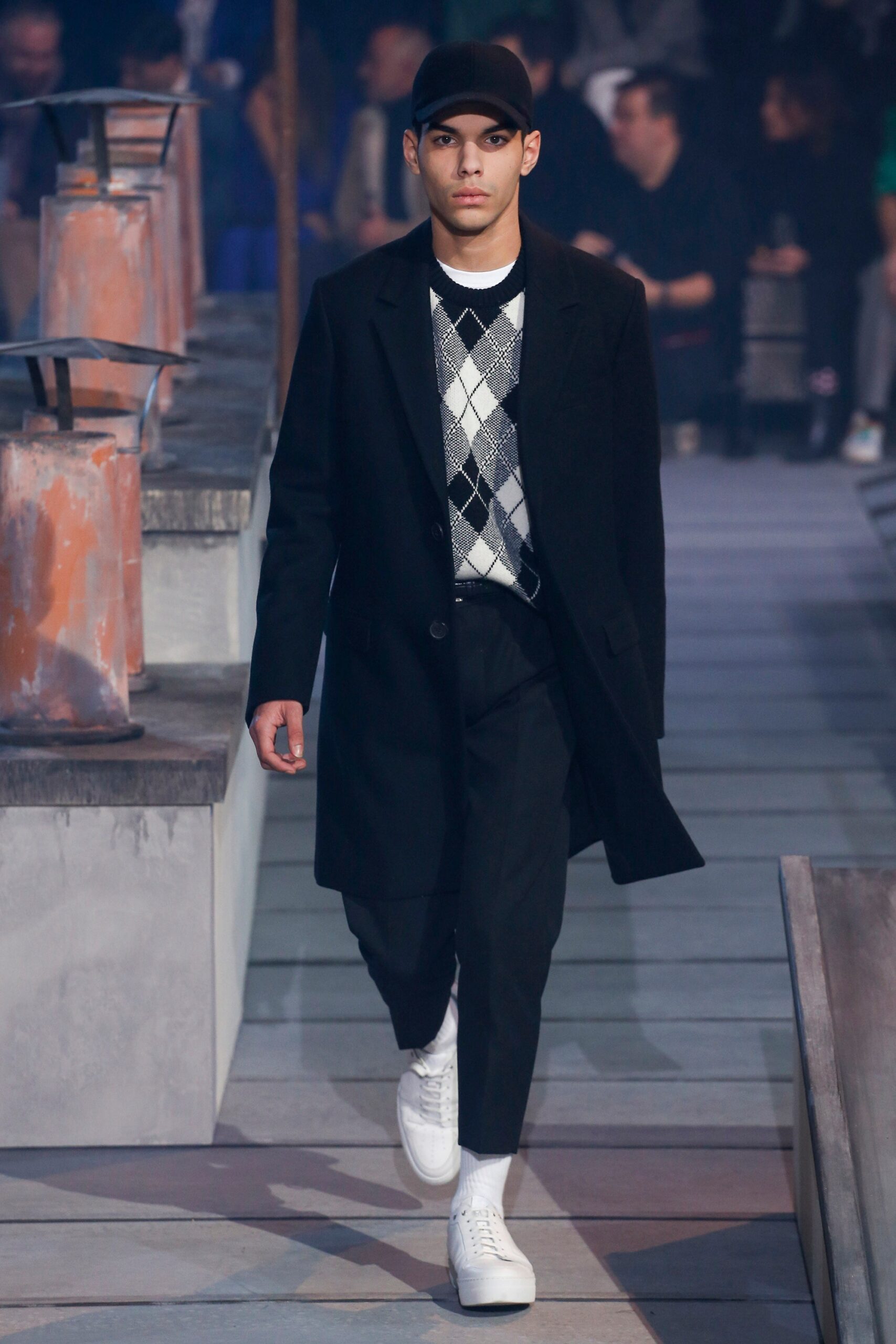 black wool coat with checked sweater