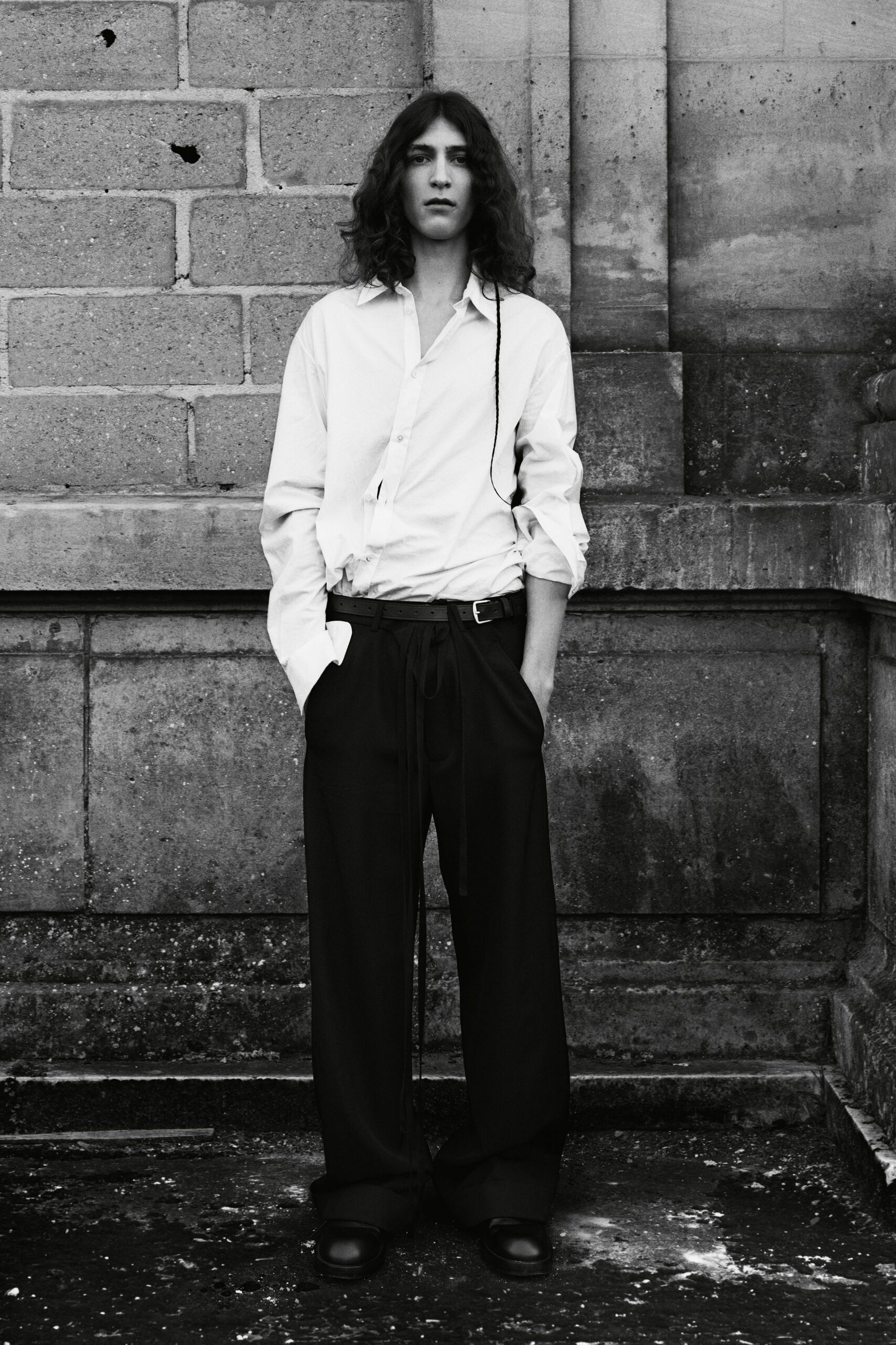 white relaxed shirt and black pants